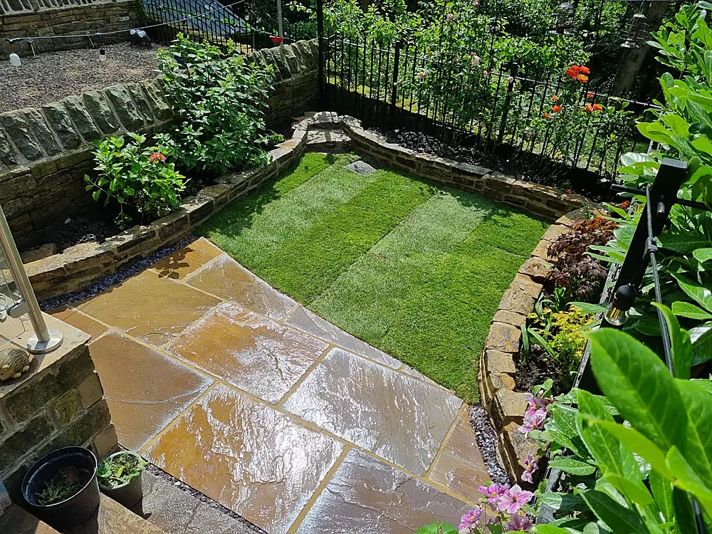 Maintained striped lawn and garden borders in Huddersfield
