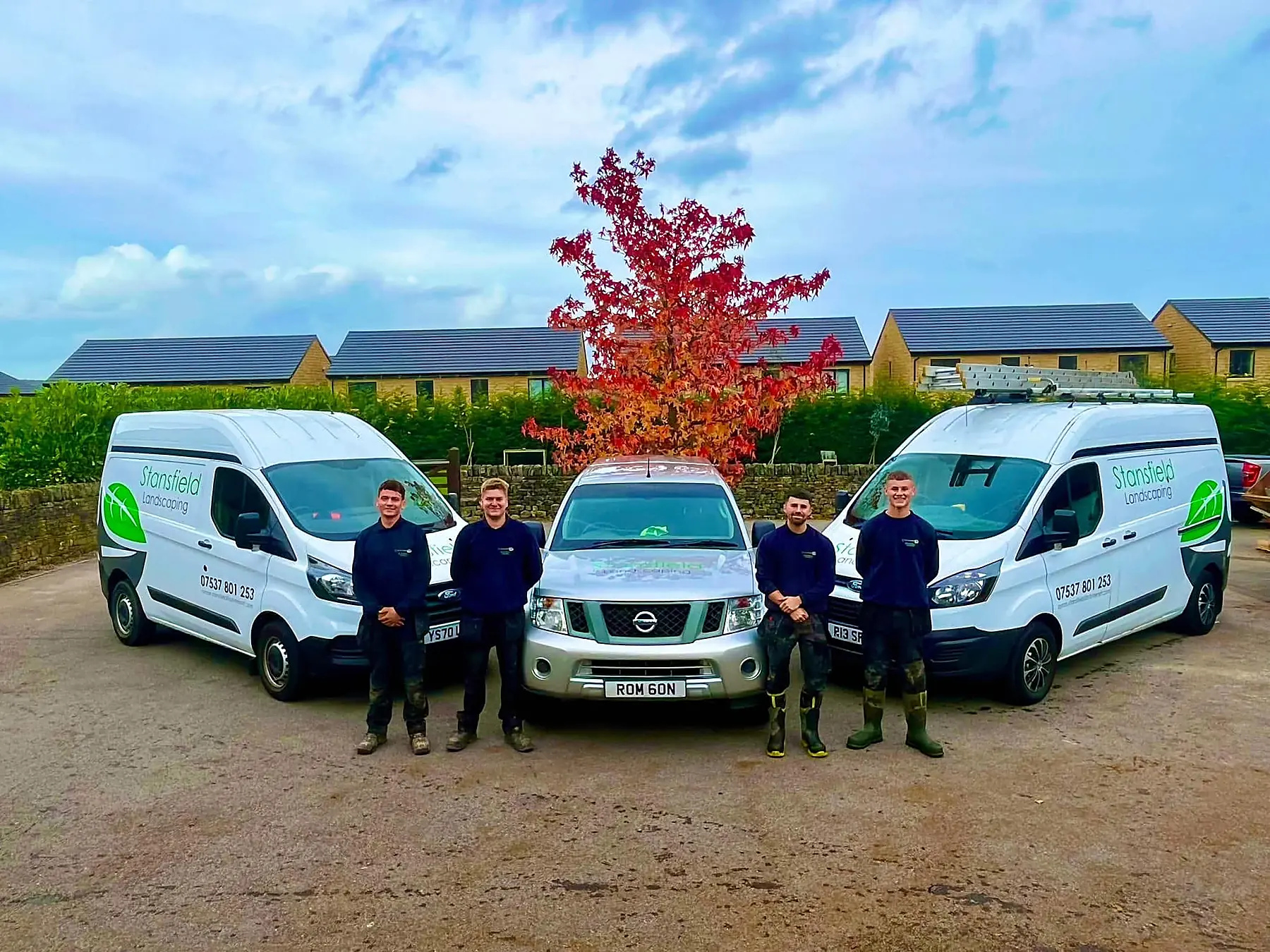 Stansfield Landscaping team with company vans, Huddersfield